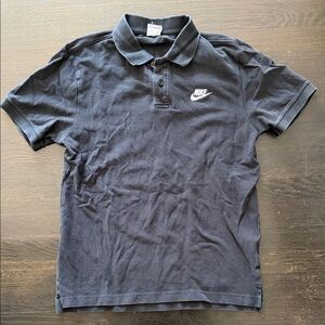 Nike Men's black  Polo with White Swoosh size small